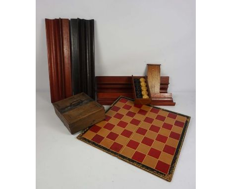 An oak double sided playing card box, with inscription alleging the timber came HMS Victory, together with a box of draughts,