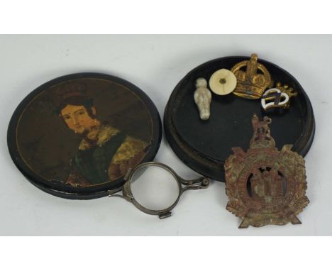 A Stobwasser type papier mache box, the lid decorated with a half length portrait of a lady, together with a pair of folding 