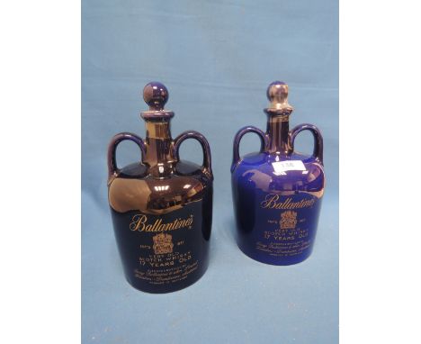 Two ceramic decanters of Ballantines 17 year old scotch whisky, one blue and one black, no strength or capacity on the decant