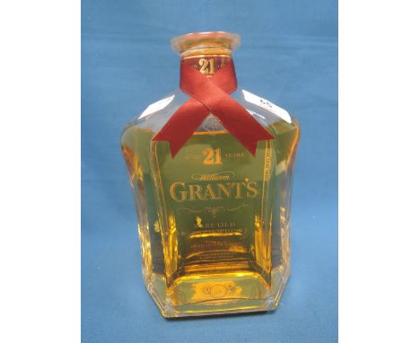 A bottle of 21 year old Grants Rare Old whisky aged in oak casks 700ml 43% vol glass decanter