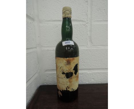 A old bottle of Gordons special scotch whisky, no strength or capacity on label