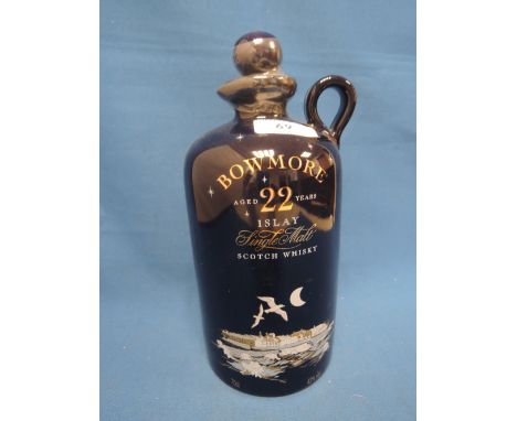 A Bowmore Gulls active 22 year old Islay single malt whisky in navy blue ceramic decanter with jug top