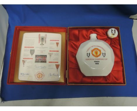 A ceramic decanter containing 70cl of specially blended 25 year old scotch whisky to commemorate the 25th anniversary of Manc
