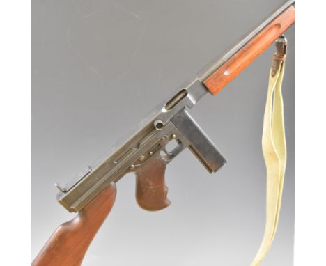 Deactivated American M1 Thompson .45 sub machine gun with extended magazine wooden stock, pistol grip and forend, canvas slin