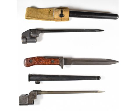 Two British spike bayonets, both with scabbards, one with frog, together with a Czechoslovakian bayonet with woodchip handle,