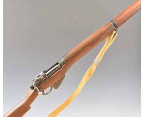 Deactivated Lee-Enfield No.4 Mk.2 .303 sniper rifle with adjustable pop-up ladder sights, storage compartment to the brass bu