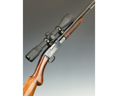 Browning .22 pump-action rifle with semi-pistol grip, Simmons Whitetail Classic 4x40 WA scope, sound moderator and 28 inch ba