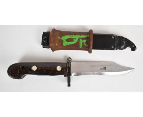 Russian AK47 bayonet with wire cutting facility, 14.5cm serrated blade, scabbard and rubber grip.&nbsp;PLEASE NOTE:- Before b