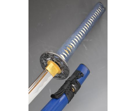 Japanese Samurai sword with bound grip, one menuki, decorated tsuba, 71cm curved blade and scabbard.&nbsp;PLEASE NOTE:- Befor