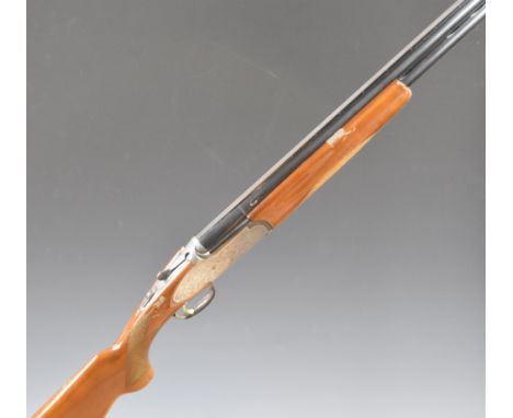 Rizzini 12 bore over and under ejector shotgun with engraved sidelock plates, trigger guard, underside, top plate and thumb l