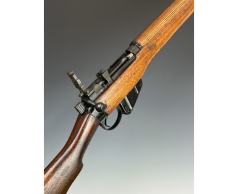 Lee-Enfield No 4 Mk I .410 shotgun converted .303 bolt-action service rifle with adjustable pop-up ladder sights, storage com