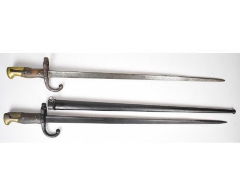 Two French Gras 1874 pattern bayonets, both with wooden grips, one dated 1880, longest blade 52cm, with scabbard.&nbsp;PLEASE