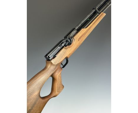 Weihrauch HW100 .22 PCP air rifle with textured semi-pistol grip, raised comb, adjustable trigger, two 14-shot magazines and 