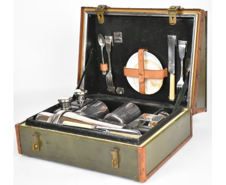 Drew &amp; Sons Piccadilly Edwardian or veteran motoring picnic set housed in a sloping footrest, marked to rear of green lea