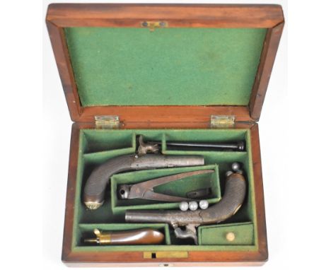 A pair of Williams &amp; Powell of Liverpool percussion hammer action muff pistols, each with named top strap, engraved actio