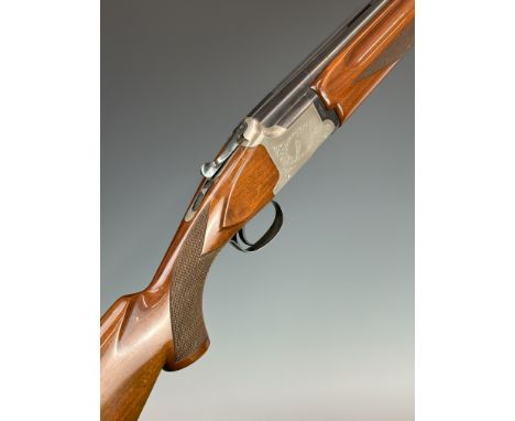 Winchester 101 XTR Lightweight 12 bore over and under ejector shotgun with engraved scenes of birds to the locks and undersid