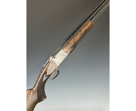 Browning Ultra XS Pro 12 bore over and under ejector shotgun with gold inlay and engraving to the locks and underside, engrav
