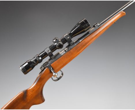 CZ 452-2E ZKM .22 bolt-action rifle with semi-pistol grip, sling mounts, scope, sound moderator and 24 inch barrel, overall l