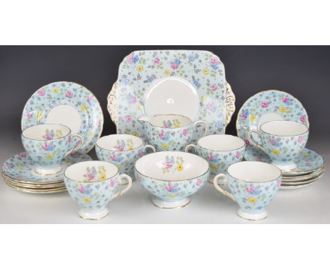 Foley China six place setting tea set decorated with flowers on a pale blue ground