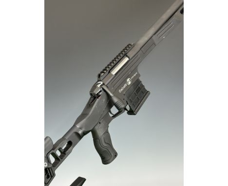 Sabatti STR 6.5 Creedmoor bolt-action rifle with textured pistol grip, adjustable skeleton stock, multi-shot magazine, scope 