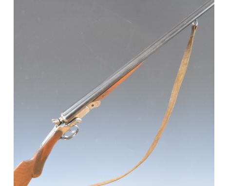 El Faisan .410 side by side hammer action folding poacher's shotgun with engraved birds to the locks and underside, chequered