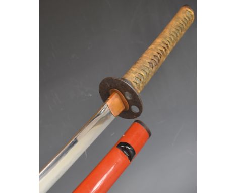 Japanese Samurai sword with bound fish skin wooden grip, two menuki, copper habaki, 73cm curved blade and scabbard.&nbsp;PLEA