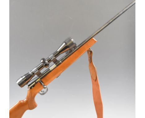 Mauser Model 107 .22 bolt-action rifle with chequered semi-pistol grip, multi-shot magazine, canvas and leather sling, Niko S