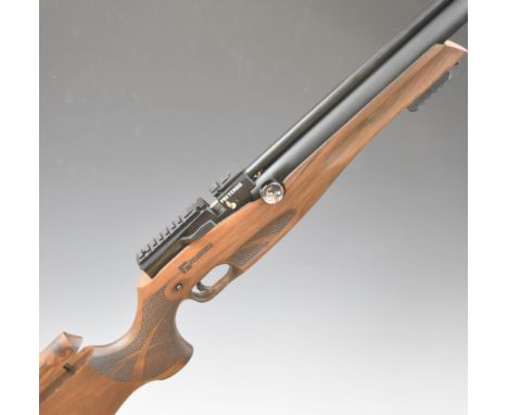 Reximex Pretensis .177 PCP air rifle with textured semi-pistol grip, adjustable comb and trigger and scope and bi-pod mounts,