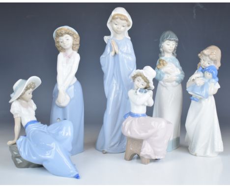 Six Nao figurines, tallest 24cm