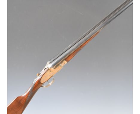 Silver Sabel De Luxe 12 bore sidelock side by side ejector shotgun&nbsp;with rose and scroll engraving to the locks, undersid