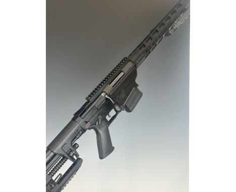 Ruger&nbsp;Precision .308 Win bolt-action rifle with textured pistol grip, fully adjustable stock, two magazines, scope rail,