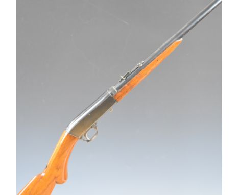 Browning .22 short semi-automatic rifle with semi-pistol grip, adjustable sights and 19 inch barrel, overall length 93cm, ser