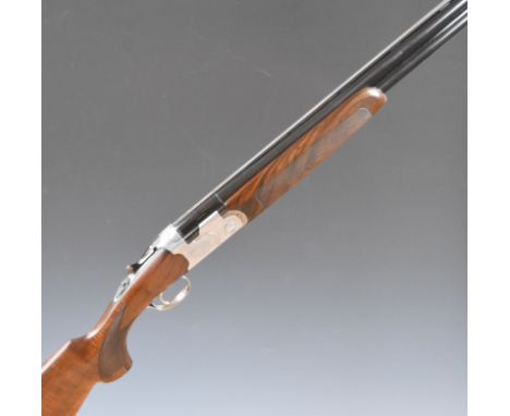 Beretta Model S687 12 bore over and under ejector shotgun with engraved scenes of birds to the locks and underside, engraved 