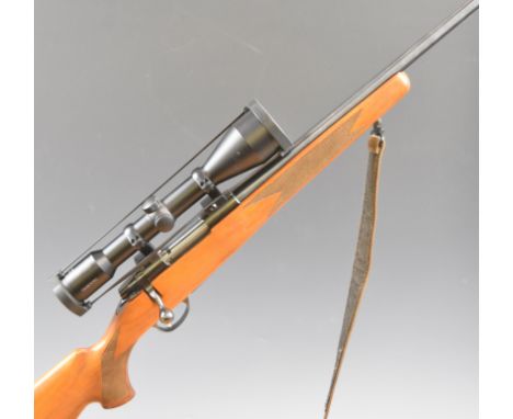Sako M591 .243 bolt-action rifle with chequered semi-pistol grip and forend, raised cheek piece, sling, Swarovski Habicht 8x5
