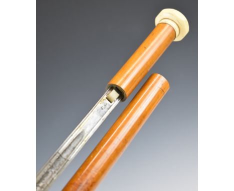 Spanish swordstick with octagonal ivory finial and 29.5 inch fullered blade with etched decoration and marked 'Toledo', with 