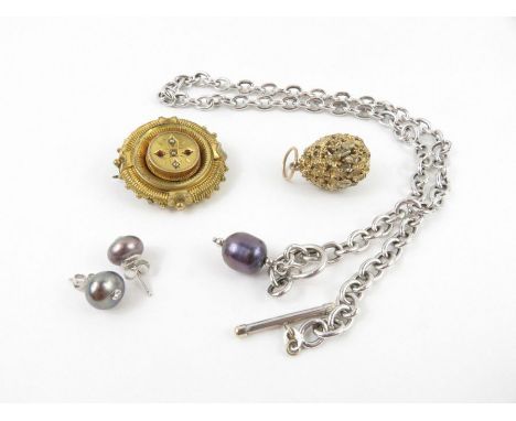 A Victorian gilt brooch, with photo locket to the back, 3.4cm round; a necklace with pearl drop; a silver gilt egg shaped pen