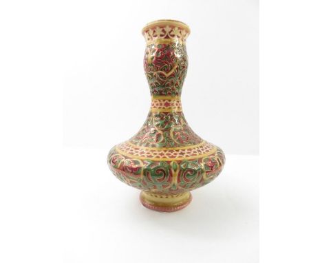 A Zsolnay pottery vase, decorated throughout with repeating patterns in red, dark green and yellow, with gilt highlights, 20c