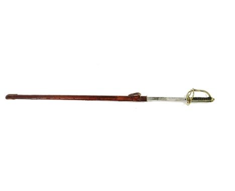 A George V engraved Royal Artillery officers sword, with an engraved blade and leather scabbard, 107cm long