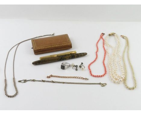 An oval moonstone pendant set into a silver mount, on a rope chain, a simulated pearl two row necklace, a pair of simulated p