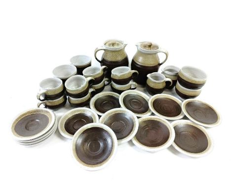 A Marianne De Trey part coffee service, comprising fourteen saucers, nine various cups, two coffee pots, two sugar bowls, two