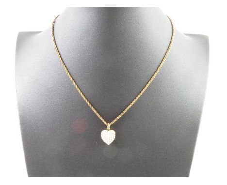 A Victorian/Edwardian split pearl heart pendant, with photo/hair section to the back, 1.5cm long excluding hanging loop, mark