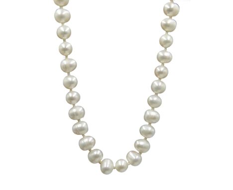 Single strand freshwater pearl necklace with silver clasp, boxed - Condition Report Tested as silver, length = 42cm