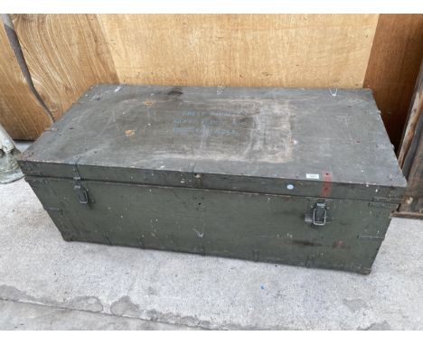 A LARGE VINTAGE MILITARY TRUNK WITH METAL BANDING AND FOUR CARRYING HANDLES (136CM X 65CM X 50CM) 