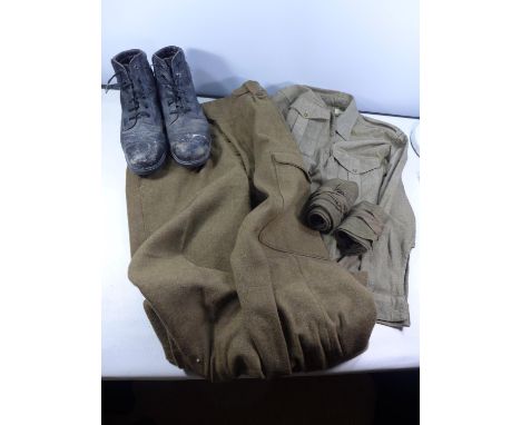 A PAIR OF BRITISH ARMY TROUSERS, SIZE 11 DATED 1956, A PAIR OF BOOTS, SHIRT, TWO PAIRS OF PUTTEES 