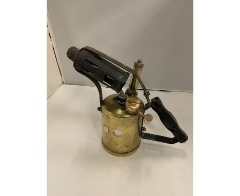 A BRASS BLOW LAMP 