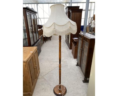 A MODERN STANDARD LAMP COMPLETE WITH SHADE 