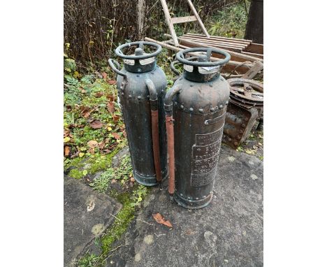 A PAIR OF VINTAGE EMPIRE FIRE EXTINGUISHERS 