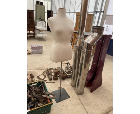 A LADIES BUST MANNEQUIN WITH STAND 