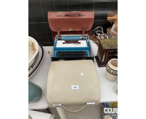 A CASED UNDERWOOD 315 TYPEWRITER AND A SATCHEL 