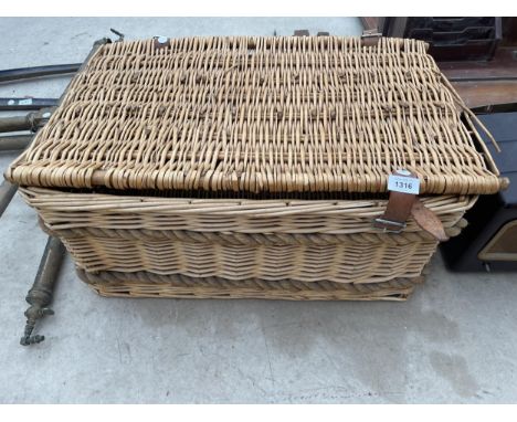A LARGE WICKER HAMPER BASKET 